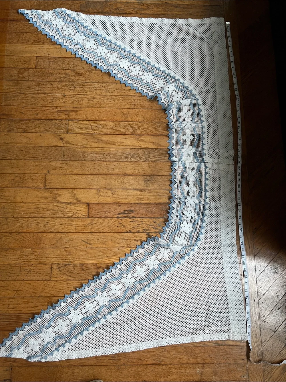 Set of curtain swags with Blue Trim.